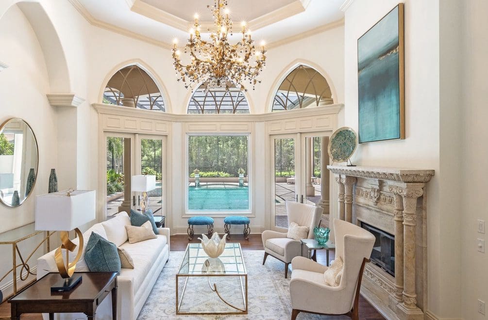 A living room with a fireplace and a pool